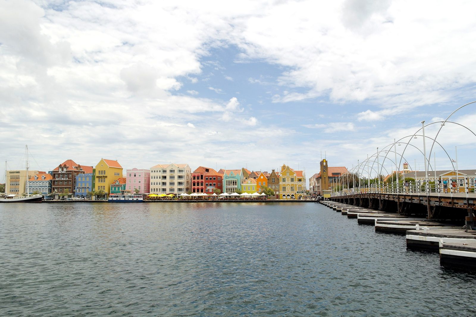 Punda's colorful waterfront and the Queen Emma Bridge in Willemstad